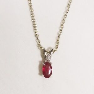 Ruby and diamond pendant necklace